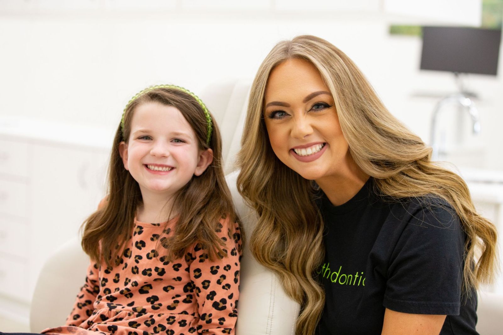 Razi Orthodontics team member with child patient